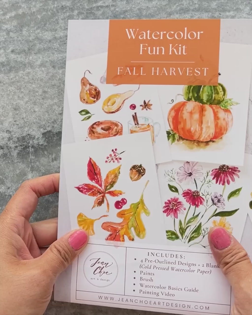 Video showing Jean Choe's watercolor fun kit for Fall Harvest of pumpkins, fall desserts and leaves, with pre-outlined pages, a paint dot card and a brush.