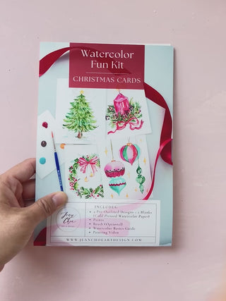 Video showing Jean Choe's watercolor fun kit for Christmas Cards, with pre-outlined pages, a paint dot card and a brush.