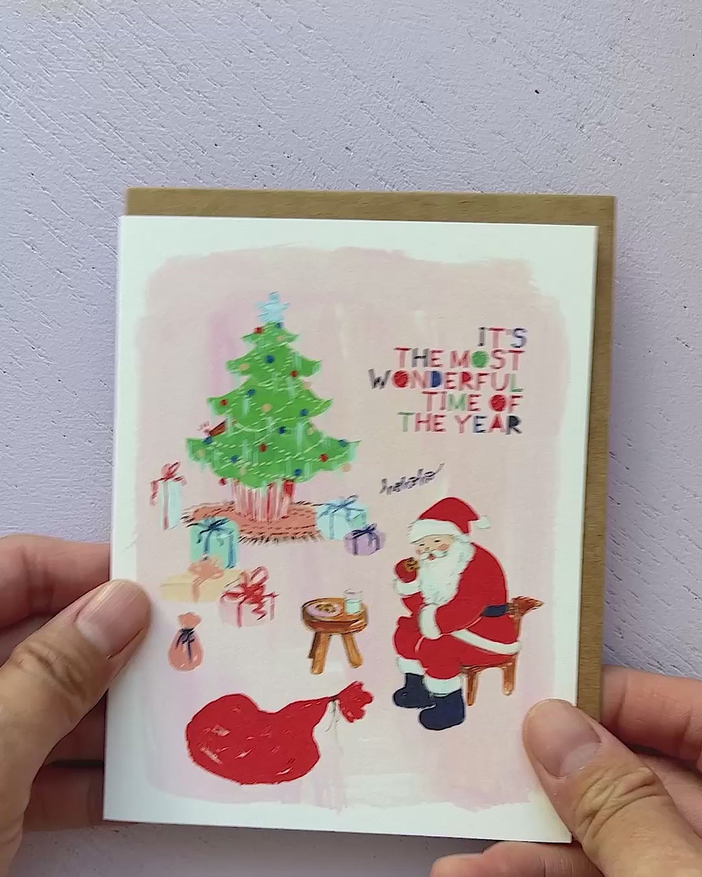 Video showing Jean Choe's Christmas greeting card of Santa eating cookie on Christmas Eve
