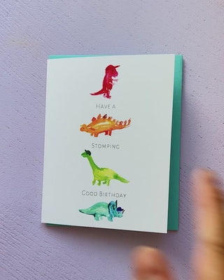 Video showing Jean Choe's greeting card of colorful dinosaurs for kid's birthday