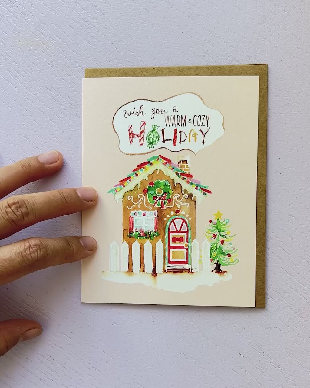Video showing Jean Choe's Christmas greeting card of watercolor gingerbread house