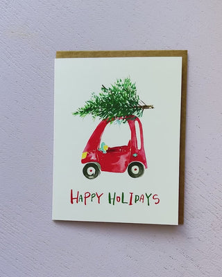 Video showing Jean Choe's greeting card of Toy Car carrying a winter Christmas tree