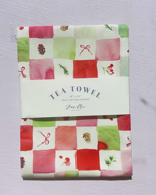 Video showing Jean Choe's cotton canvas tea towel with vibrant watercolor holiday checkers